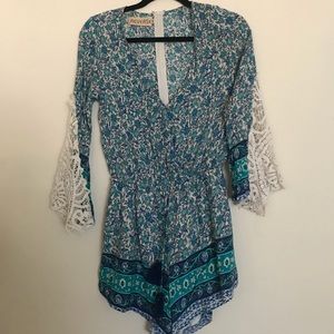 Blue print romper with lace detail sleeves
